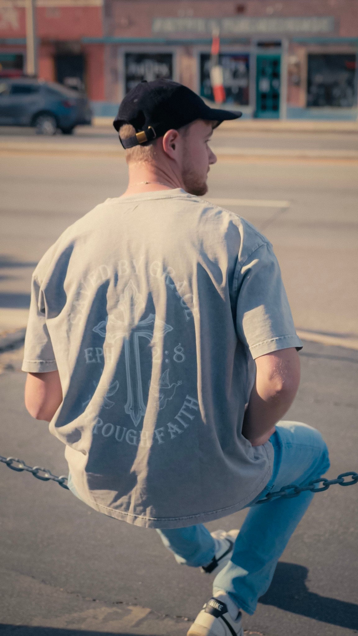 Christian clothing grey saved by grace T-Shirt back view with model