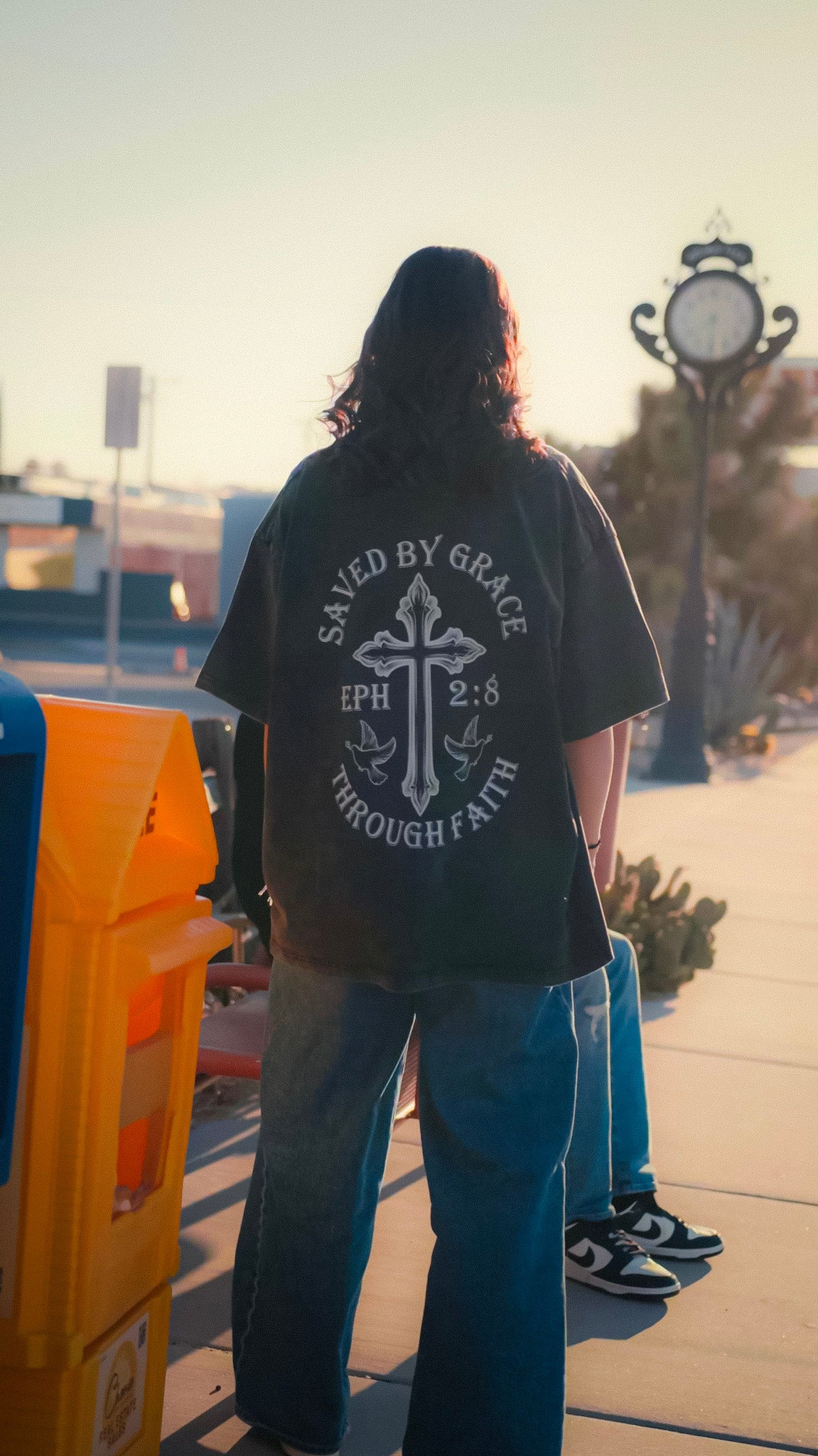 Christian clothing black saved by grace T-Shirt back view with model